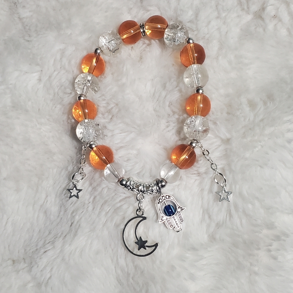 Orange and Clear Beaded Bracelet with Charms